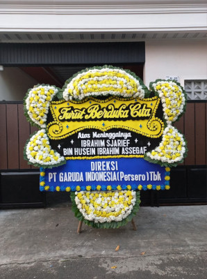 Papan Bunga Duka di Mengger