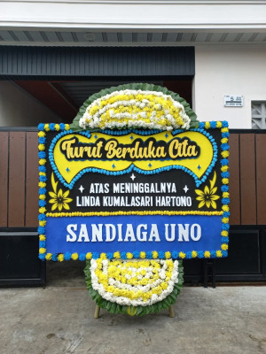 Papan Bunga Duka di Mengger